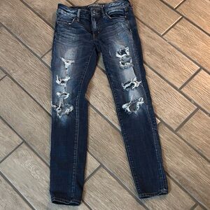 Distressed Blue Jeans